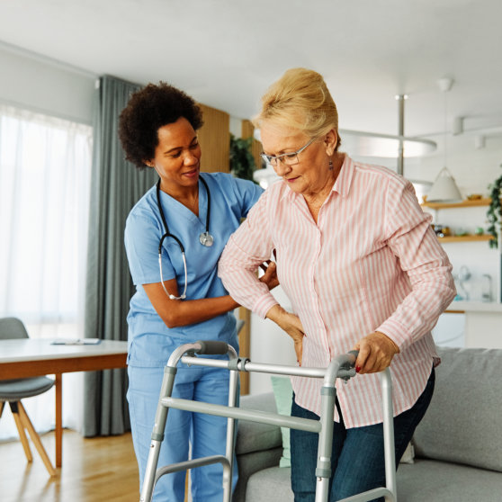 caregiver assisting elderly