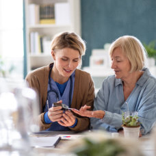 caregiver checking elderly