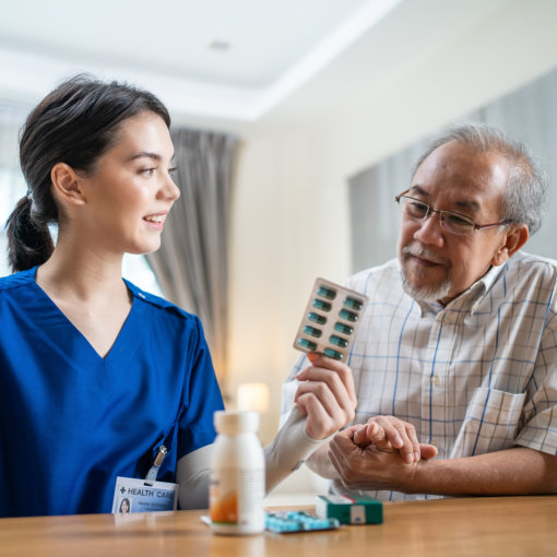 Caregiver giving medicine