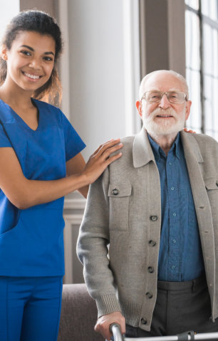 caregiver and elderly smiling