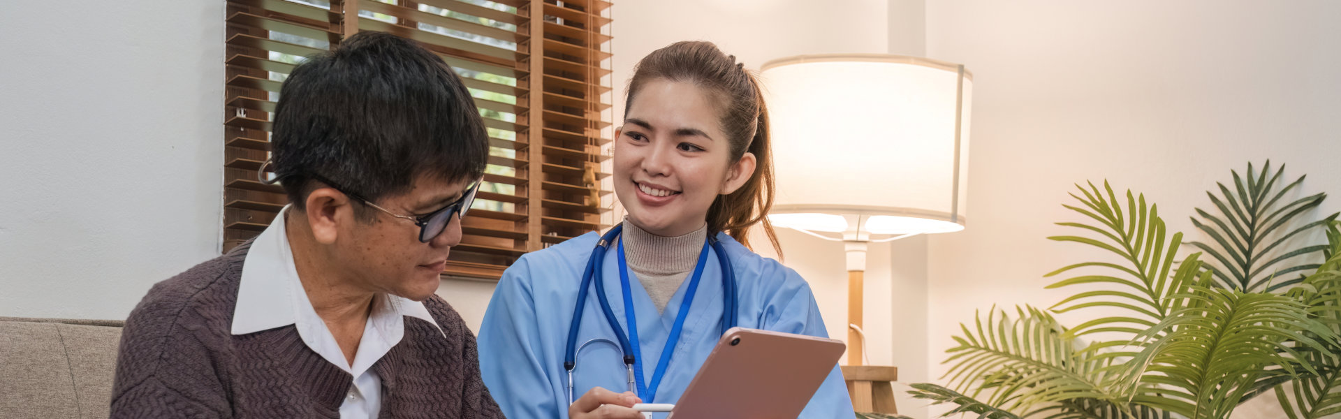 caregiver interviewing elderly