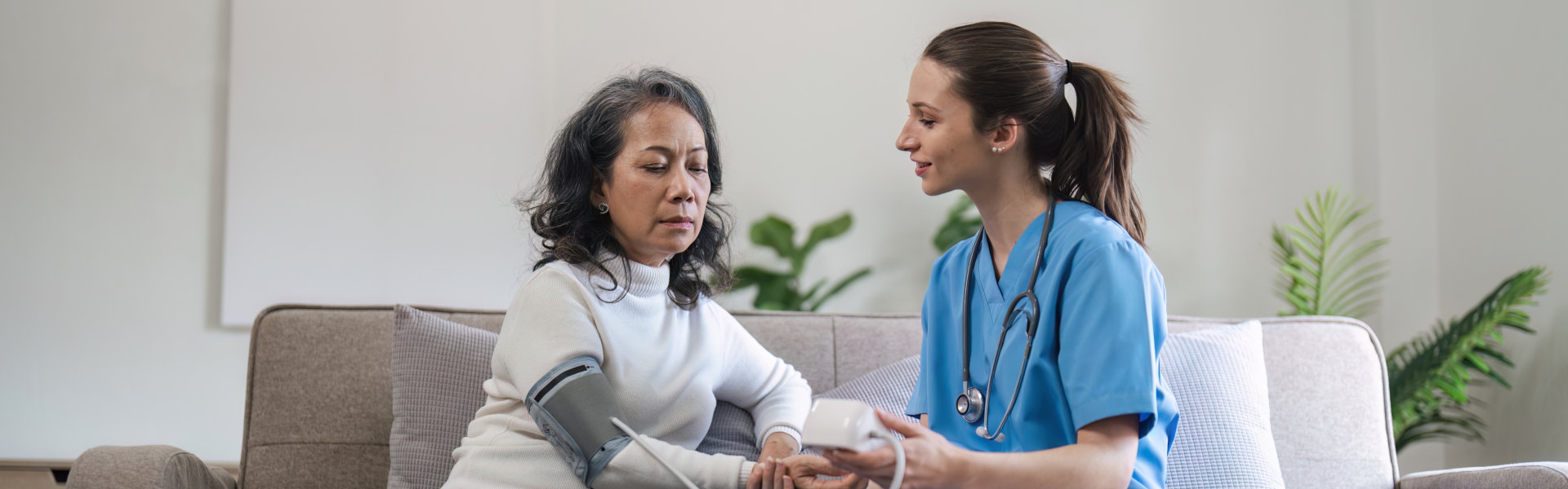 caregiver checking elderly