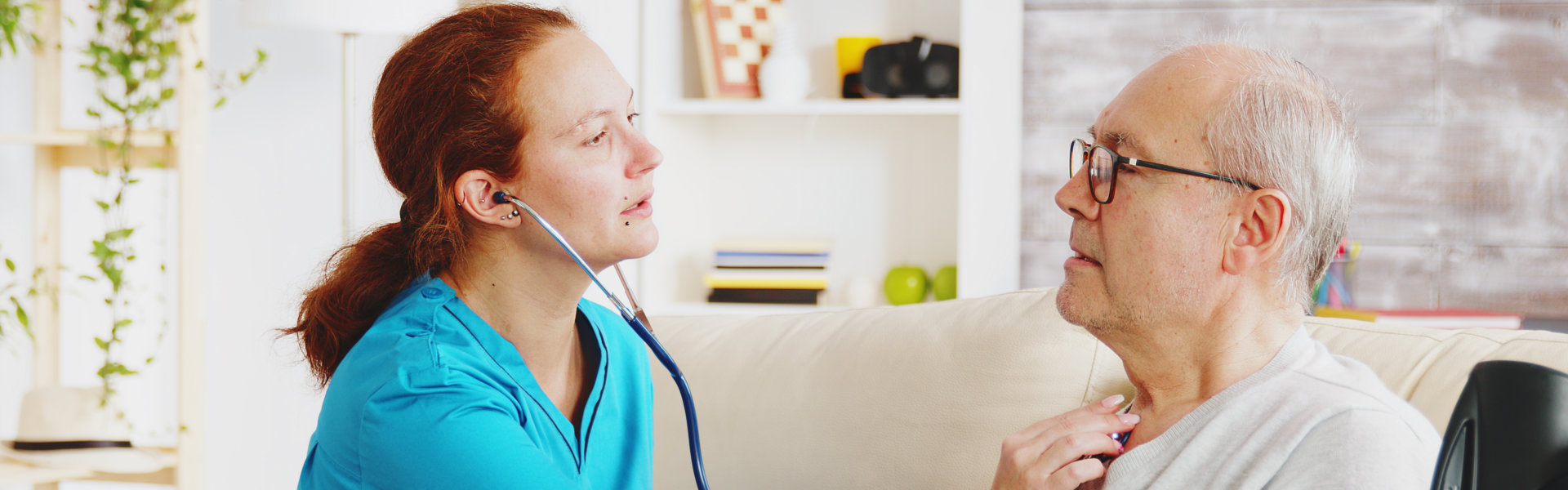 caregiver checking elderly